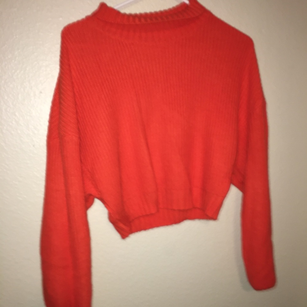 Orange cropped poofy sleeved turtleneck